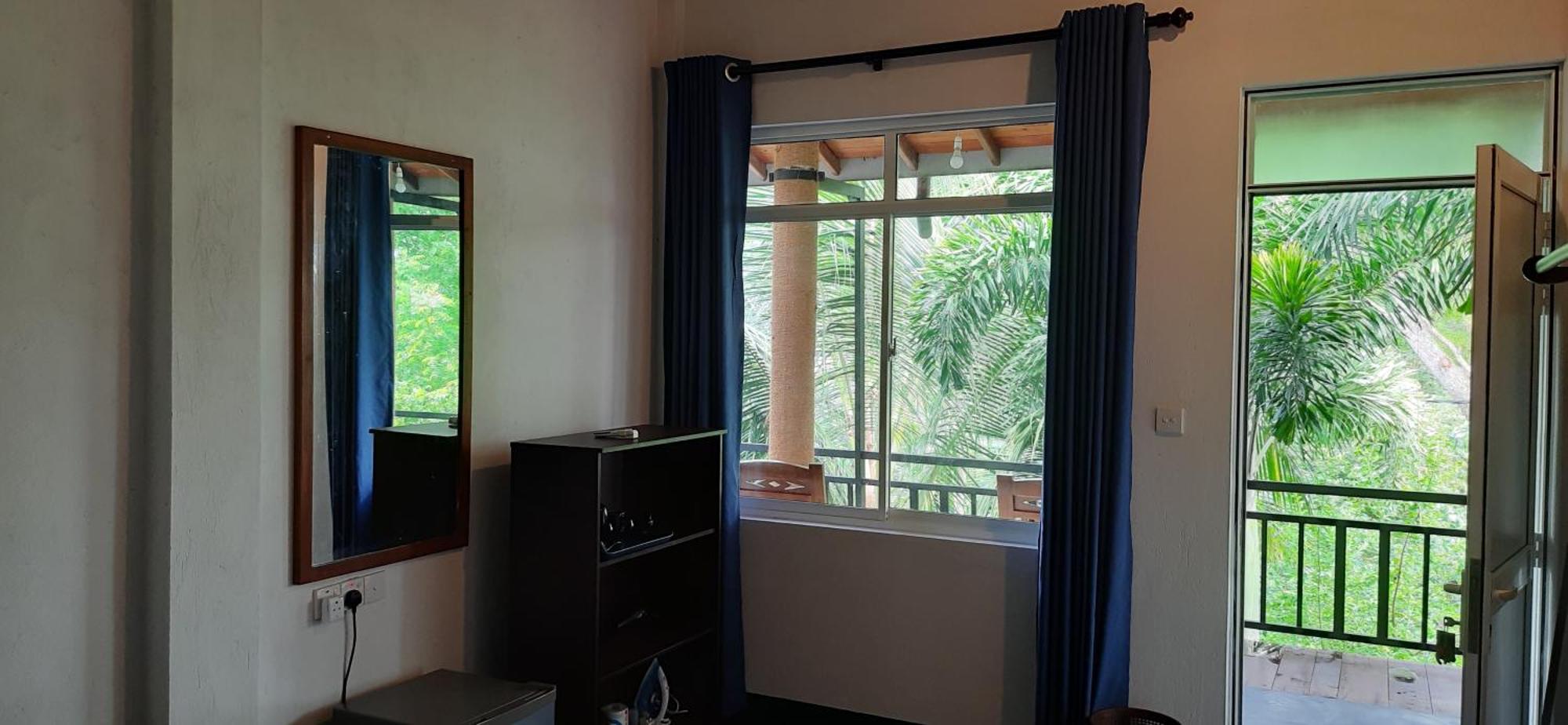 ホテル Tamarind Blue タンガラ 部屋 写真
